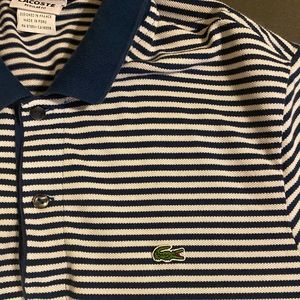 Light worn Men’s Lacoste polo shirt size large